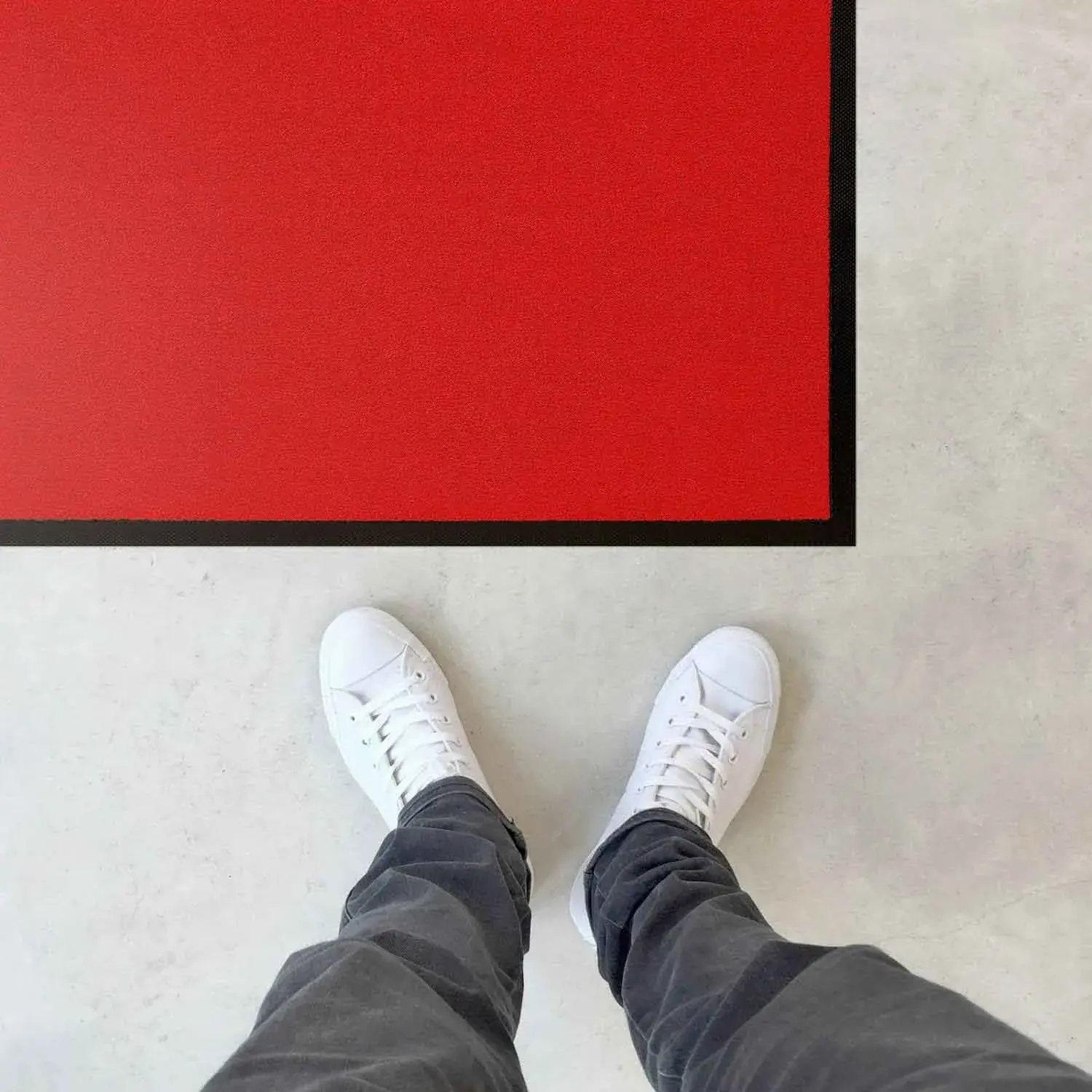 Vloerverzorging door middel van een rode mat